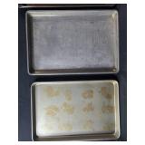 Collection of Baking Sheets, Round Cake Pans, and Wood Cutting Board Collection of Baking Sheets, Round Cake Pans, and Wood Cutting Board