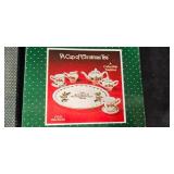 Holiday Decor and Collectibles Assortment Including Christmas Ornaments, Tea Set, and Mini Cars Holiday Decor and Collectibles Assortment Including Christmas Ornaments, Tea Set, and Mini Cars