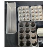Collection of Bakeware and Decorative Plates Including Muffin Pans, Loaf Pans, Pizza Pan, and Fruit Plate Collection of Bakeware and Decorative Plates Including Muffin Pans, Loaf Pans, Pizza Pan, and Fruit Plate