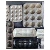 Collection of Bakeware and Decorative Plates Including Muffin Pans, Loaf Pans, Pizza Pan, and Fruit Plate Collection of Bakeware and Decorative Plates Including Muffin Pans, Loaf Pans, Pizza Pan, and Fruit Plate