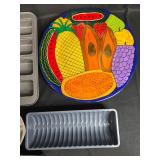 Collection of Bakeware and Decorative Plates Including Muffin Pans, Loaf Pans, Pizza Pan, and Fruit Plate Collection of Bakeware and Decorative Plates Including Muffin Pans, Loaf Pans, Pizza Pan, and Fruit Plate