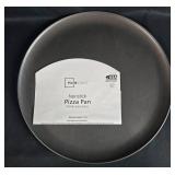 Collection of Bakeware and Decorative Plates Including Muffin Pans, Loaf Pans, Pizza Pan, and Fruit Plate Collection of Bakeware and Decorative Plates Including Muffin Pans, Loaf Pans, Pizza Pan, and Fruit Plate
