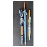 Group of Assorted Vintage and Patterned Umbrellas with Wooden Handles Group of Assorted Vintage and Patterned Umbrellas with Wooden Handles
