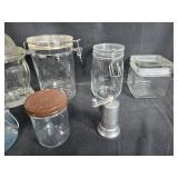 Collection of Assorted Glass Canisters and Jars with Metal Grinder Collection of Assorted Glass Canisters and Jars with Metal Grinder