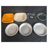 Assorted Bakeware Lot with Pie Pans, Casserole Dishes, and Woven Basket Assorted Bakeware Lot with Pie Pans, Casserole Dishes, and Woven Basket