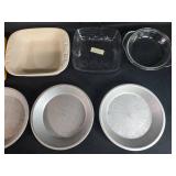 Assorted Bakeware Lot with Pie Pans, Casserole Dishes, and Woven Basket Assorted Bakeware Lot with Pie Pans, Casserole Dishes, and Woven Basket