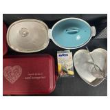 Assorted Kitchenware Lot with Bakeware, Grater, Coffee Filters, and Tableware Assorted Kitchenware Lot with Bakeware, Grater, Coffee Filters, and Tableware