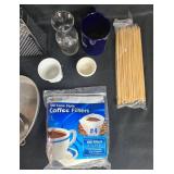 Assorted Kitchenware Lot with Bakeware, Grater, Coffee Filters, and Tableware Assorted Kitchenware Lot with Bakeware, Grater, Coffee Filters, and Tableware