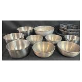 Collection of Stainless Steel Mixing Bowls and Cast Aluminum Bundt Pans Collection of Stainless Steel Mixing Bowls and Cast Aluminum Bundt Pans