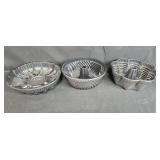 Collection of Stainless Steel Mixing Bowls and Cast Aluminum Bundt Pans Collection of Stainless Steel Mixing Bowls and Cast Aluminum Bundt Pans