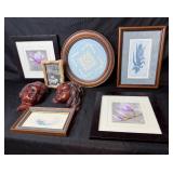 Collection of Framed Artworks and Wall Decor Including Carved Faces and Floral Prints Collection of Framed Artworks and Wall Decor Including Carved Faces and Floral Prints