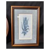 Collection of Framed Artworks and Wall Decor Including Carved Faces and Floral Prints Collection of Framed Artworks and Wall Decor Including Carved Faces and Floral Prints