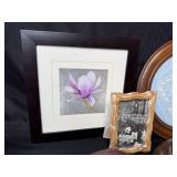 Collection of Framed Artworks and Wall Decor Including Carved Faces and Floral Prints Collection of Framed Artworks and Wall Decor Including Carved Faces and Floral Prints