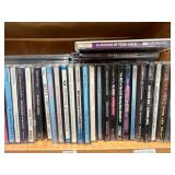 Collection of Music CDs Featuring Various Genres and Artists - shelf not inc Collection of Music CDs Featuring Various Genres and Artists - shelf not inc