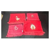 Assorted Holiday Decor Lot with Red Towels, Garland, and Figurines Assorted Holiday Decor Lot with Red Towels, Garland, and Figurines