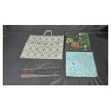 Collection of Framed Artwork, Sheet Protectors, Paper Bags, and Decorative Paper Collection of Framed Artwork, Sheet Protectors, Paper Bags, and Decorative Paper