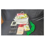 Collection of Framed Artwork, Sheet Protectors, Paper Bags, and Decorative Paper Collection of Framed Artwork, Sheet Protectors, Paper Bags, and Decorative Paper