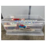 Large Plastic Tote of Assorted Holiday and Gift Wrapping Paper Rolls Large Plastic Tote of Assorted Holiday and Gift Wrapping Paper Rolls