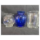 Set of Assorted Glass Flower Vases Including Blue and Clear Designs Set of Assorted Glass Flower Vases Including Blue and Clear Designs