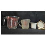 Kitchenware Lot with Pyrex Measuring Cups, Ceramic Ramekin, and Tylor Oven Thermometer Kitchenware Lot with Pyrex Measuring Cups, Ceramic Ramekin, and Tylor Oven Thermometer