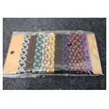 11-20 packs of elastic hair ties...