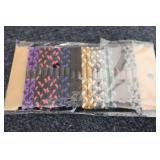 11-20 packs of elastic hair ties...