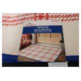 3-24in x 36in reversible rugs...