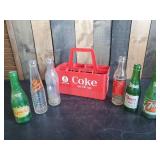 Collectible Plastic Coke Crate with Handle and Various Vintage Soda Bottles