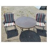 Metal Table and two metal Folding Chairs with Cusions