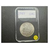 1887 Morgan Silver Dollar Marked UNC When Purchased 1887 Morgan Silver Dollar Marked UNC When Purchased