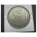 1900 Morgan Silver Dollar Marked UNC When Purchased 1900 Morgan Silver Dollar Marked UNC When Purchased