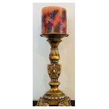 Three-Tiered Gold Patina Candleholders and Red Candles