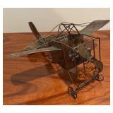 Vintage Brutalist Style Biplane and Piano Man Metal Music Boxes