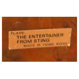 Vintage Brutalist Style Biplane and Piano Man Metal Music Boxes