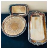 Collection of Silverplated Serving Pieces, Flatware, and Candle Holders