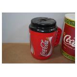 Coca-Cola Collectibles - Tins, Travel Mug, Garbage Bin Coca-Cola Collectibles - Tins, Travel Mug, Garbage Bin