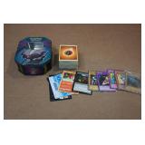 Assorted Pokemon Cards and Tin Assorted Pokemon Cards and Tin
