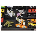 Assorted Micro Machines Vehicles in Cary Case Assorted Micro Machines Vehicles in Cary Case