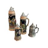 Set of 4 German Beer Steins with Pewter Lids, One with Musical Feature Set of 4 German Beer Steins with Pewter Lids, One with Musical Feature