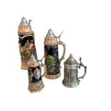 Set of 4 German Beer Steins with Pewter Lids, One with Musical Feature Set of 4 German Beer Steins with Pewter Lids, One with Musical Feature