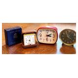 Collection of 3 Vintage Travel Clocks including Seth Thomas, Infinity, and Westclox Collection of 3 Vintage Travel Clocks including Seth Thomas, Infinity, and Westclox