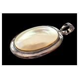 Sterling Silver Mother of Pearl Oval Pendant 1.5 Inch Sterling Silver Mother of Pearl Oval Pendant 1.5 Inch