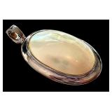 Sterling Silver Mother of Pearl Oval Pendant 1.5 Inch Sterling Silver Mother of Pearl Oval Pendant 1.5 Inch