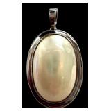 Sterling Silver Mother of Pearl Oval Pendant 1.5 Inch Sterling Silver Mother of Pearl Oval Pendant 1.5 Inch