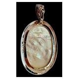 Sterling Silver Mother of Pearl Oval Pendant 1.5 Inch Sterling Silver Mother of Pearl Oval Pendant 1.5 Inch