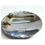 Sterling Silver Nakai Brooch with Oval Gemstone Inlay Sterling Silver Nakai Brooch with Oval Gemstone Inlay