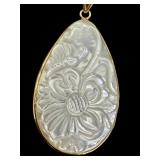 Carved Mother of Pearl Pendant with 14K Gold Setting Carved Mother of Pearl Pendant with 14K Gold Setting