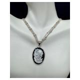 Sterling Silver Cameo Pendant Necklace with 20 Inch Chain Sterling Silver Cameo Pendant Necklace with 20 Inch Chain