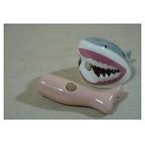 Novelty Magnetic Salt & Pepper Shaker -Shark and Leg Novelty Magnetic Salt & Pepper Shaker -Shark and Leg