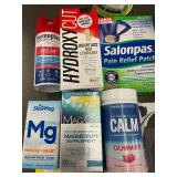 Assorted Health and Wellness Products Including Supplements, Pain Relief, and Personal Care